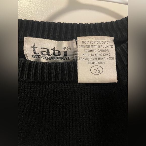 Black pull over crewneck size large but fits small id size it at a medium. - Picture 2 of 4